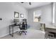 Bright office space with dual monitors, a window, and a secondary study space at 12738 Boggs St, Parker, CO 80134