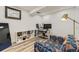 Finished basement with a dedicated office area, closet, and modern flooring for comfortable living at 1600 S Quebec Way # 8, Denver, CO 80231
