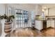 Bright kitchen featuring a stainless steel sink and modern white cabinetry at 1600 S Quebec Way # 8, Denver, CO 80231