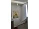 Bright stairwell with modern lighting and a decorative painting, creating an inviting and stylish transition space at 1600 S Quebec Way # 8, Denver, CO 80231
