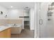 Bathroom featuring a tiled tub, shower, and well-organized closet at 1820 Mary Ln # 1, Boulder, CO 80304