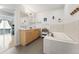 Bathroom boasting a soaking tub, double vanity, and view to the deck at 1820 Mary Ln # 1, Boulder, CO 80304