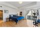 Bright bedroom featuring hardwood floors, a large window, and modern decor at 1820 Mary Ln # 1, Boulder, CO 80304