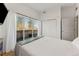 Bedroom with sliding glass door to the outdoor balcony at 1820 Mary Ln # 1, Boulder, CO 80304