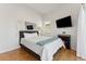 Modern bedroom featuring a fireplace and wall-mounted TV at 1820 Mary Ln # 1, Boulder, CO 80304
