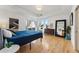 Spacious bedroom with hardwood floors, large windows, and modern decor at 1820 Mary Ln # 1, Boulder, CO 80304