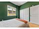 Bedroom featuring a window view and ample closet space at 1820 Mary Ln # 1, Boulder, CO 80304