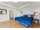 Bright bedroom featuring wood floors, a large bed, and modern decor at 1820 Mary Ln # 1, Boulder, CO 80304