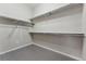Walk-in closet with ample shelving and gray tile flooring at 1820 Mary Ln # 1, Boulder, CO 80304