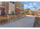 Rear exterior of brick building with patio access at 1820 Mary Ln # 1, Boulder, CO 80304