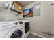 Laundry room equipped with washer, dryer and overhead storage at 1820 Mary Ln # 1, Boulder, CO 80304