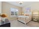 Cozy bedroom with a bright window, stylish decor, and plenty of natural light at 15720 Columbus Mountain Dr, Broomfield, CO 80023