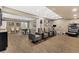 Spacious basement living room with wood floors, comfortable seating, and ample space for entertainment at 15720 Columbus Mountain Dr, Broomfield, CO 80023