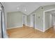 Spacious bedroom boasts vaulted ceilings and bright hardwood floors at 1720 Trenton St, Denver, CO 80220