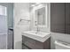 Contemporary bathroom featuring a stylish sink, modern fixtures, and clean design at 720 16Th St # 306, Denver, CO 80202