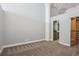 This bedroom has a neutral color palette, high ceilings, and a walk in closet at 720 16Th St # 306, Denver, CO 80202