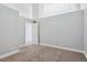 Bright bedroom features neutral color palette, high ceilings, and soft carpeted floor at 720 16Th St # 306, Denver, CO 80202