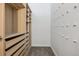 Bright walk-in closet featuring custom shelving and ample space at 720 16Th St # 306, Denver, CO 80202