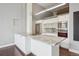 Bright kitchen with large island and stainless steel appliances at 720 16Th St # 306, Denver, CO 80202