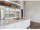 Well-equipped kitchen with sleek marble countertops and contemporary cabinetry at 720 16Th St # 306, Denver, CO 80202