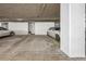 Underground parking garage with parked cars at 720 16Th St # 306, Denver, CO 80202
