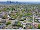 An aerial view of the neighborhood showcasing the cityscape and the tree-lined streets at 2235 W 46Th Ave, Denver, CO 80211