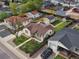 Aerial view of home and neighborhood with well-maintained lawns and mature trees at 2235 W 46Th Ave, Denver, CO 80211