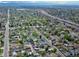 An aerial view of the neighborhood with a highway and lush tree coverage in the residential area at 2235 W 46Th Ave, Denver, CO 80211