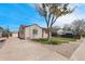 Charming home with a well-maintained front yard and long driveway at 2235 W 46Th Ave, Denver, CO 80211