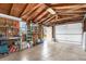 The interior of the garage with a large opening leading to the property's exterior at 2235 W 46Th Ave, Denver, CO 80211