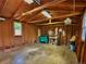 Inside the garage: workbench, tools, concrete floor, and window at 2235 W 46Th Ave, Denver, CO 80211