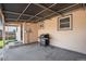 Cozy covered patio with a grill, ideal for outdoor entertaining at 2235 W 46Th Ave, Denver, CO 80211