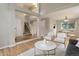 Spacious open-concept living room and dining area featuring hardwood floors and neutral decor at 8652 Aberdeen Cir, Highlands Ranch, CO 80130