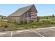 View of a rustic barn with an American flag mural on the side at 1373 E Witherspoon Dr, Elizabeth, CO 80107
