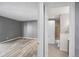 Cozy bedroom leading to ensuite bathroom at 11103 E Alameda Ave # 201, Aurora, CO 80012