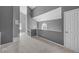 Open upstairs hallway with natural light, carpeted flooring, and neutral paint at 11103 E Alameda Ave # 201, Aurora, CO 80012