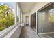 Enclosed patio featuring lots of sunlight, windows, and a sliding glass door at 11103 E Alameda Ave # 201, Aurora, CO 80012