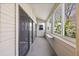 Relaxing sunroom with sliding glass doors, lots of light, and outdoor views at 11103 E Alameda Ave # 201, Aurora, CO 80012