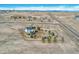 Aerial view of a house with a large yard at 600 Coyote Trl, Elizabeth, CO 80107