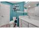Stylish bathroom with a modern toilet, vanity sink, shelving decor, and updated fixtures at 600 Coyote Trl, Elizabeth, CO 80107