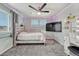 A modern bedroom with stylish decorations, a comfortable bed, and soft carpeting at 600 Coyote Trl, Elizabeth, CO 80107
