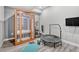 Exercise room featuring luxury vinyl plank floors, a sauna, a trampoline and free weights at 600 Coyote Trl, Elizabeth, CO 80107