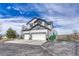 Two-story home with three car garage with beautiful landscape at 600 Coyote Trl, Elizabeth, CO 80107