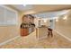 Basement bar area with tiled floors and custom cabinets perfect for entertaining at 6783 E Orchard Rd, Greenwood Village, CO 80111