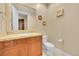 Cozy bathroom featuring a vanity with a granite counter and stylish decor at 6783 E Orchard Rd, Greenwood Village, CO 80111