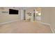 Spacious bedroom with carpet, connected to a stylish en-suite bathroom at 6783 E Orchard Rd, Greenwood Village, CO 80111