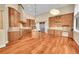 Spacious kitchen with custom cabinets, granite countertops, and stainless steel appliances at 6783 E Orchard Rd, Greenwood Village, CO 80111