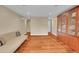 Spacious living room with hardwood floors and plenty of space for entertaining at 6783 E Orchard Rd, Greenwood Village, CO 80111
