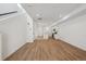 Expansive open-concept space featuring modern flooring and leading into the kitchen at 1242 Penner Dr, Erie, CO 80026