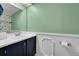 Clean bathroom with a sleek vanity, modern fixtures, and a mirror at 18273 E Arizona Ave # D, Aurora, CO 80017